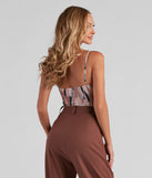 With fun and flirty details, Brush Strokes Tie-Waist Bodysuit shows off your unique style for a trendy outfit for the summer season!