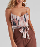 With fun and flirty details, Brush Strokes Tie-Waist Bodysuit shows off your unique style for a trendy outfit for the summer season!