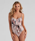 With fun and flirty details, Brush Strokes Tie-Waist Bodysuit shows off your unique style for a trendy outfit for the summer season!