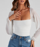 Elevated Basic Ruched Mesh Bodysuit with on-trend details provides a stylish start to creating your graduation outfit for the 2024 Commencement or grad party!