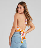 With fun and flirty details, Retro Fab Floral Halter Crop Top shows off your unique style for a trendy outfit for the summer season!