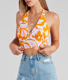 With fun and flirty details, Retro Fab Floral Halter Crop Top shows off your unique style for a trendy outfit for the summer season!