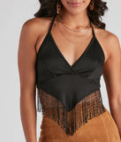 With fun and flirty details, Modern Boho Halter Fringe Crop Top shows off your unique style for a trendy outfit for the summer season!
