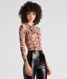 With fun and flirty details, All About The 70s Mesh Print Bodysuit shows off your unique style for a trendy outfit for the summer season!