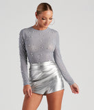 All That Shine Pearl And Rhinestone Bodysuit creates the perfect New Year’s Eve Outfit or new years dress with stylish details in the latest trends to ring in 2023!