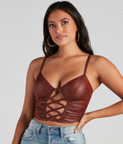 With fun and flirty details, Late Night Faux Leather Lattice Crop Top shows off your unique style for a trendy outfit for the summer season!