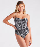 With fun and flirty details, Keep It Fab Marble Swirl Bodysuit shows off your unique style for a trendy outfit for the summer season!