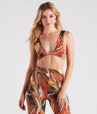 You�ll look stunning in the Abstract Chic Twist-Front Crop Top when paired with its matching separate to create a glam clothing set perfect for parties, date nights, concert outfits, or for any spring event!