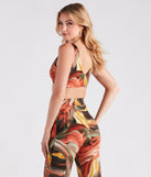 You�ll look stunning in the Abstract Chic Twist-Front Crop Top when paired with its matching separate to create a glam clothing set perfect for parties, date nights, concert outfits, or for any spring event!