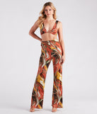 You�ll look stunning in the Abstract Chic Twist-Front Crop Top when paired with its matching separate to create a glam clothing set perfect for parties, concert outfits, or for any spring event!
