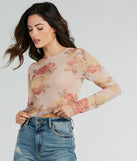 With fun and flirty details, the Elevate The Charm Long Sleeve Floral Mesh Crop Top shows off your unique style for a trendy outfit for summer!
