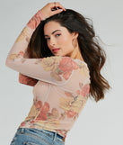 With fun and flirty details, the Elevate The Charm Long Sleeve Floral Mesh Crop Top shows off your unique style for a trendy outfit for summer!