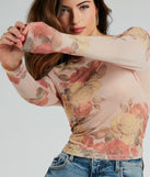 With fun and flirty details, the Elevate The Charm Long Sleeve Floral Mesh Crop Top shows off your unique style for a trendy outfit for summer!