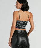 The waist-defining bodice style of the In Plain Sight Camouflage Mesh Bustier is perfect for making a statement with your outfit and provides the boning, molded cups, or lace-up details that capture the corset trend.