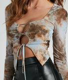 Whether fitted or flowy, the Getting Attention Abstract Print Mesh Crop Top is a long-sleeve top that offers endless styling options as a layer or a standalone piece to elevate your outfit for the season.