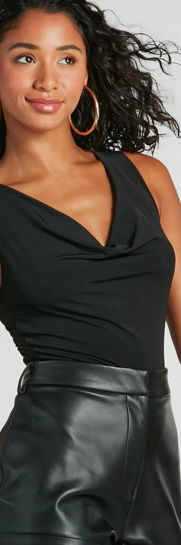 With fun and flirty details, the Party In The Back Cowl Neck Strappy Bodysuit shows off your unique style for a trendy outfit for the summer or fall season!