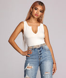 With fun and flirty details, Baseline Ribbed Cutout Tank shows off your unique style for a trendy outfit for the summer season!