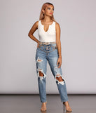 With fun and flirty details, Baseline Ribbed Cutout Tank shows off your unique style for a trendy outfit for the summer season!