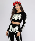 You’ll look stunning in the Glow-In-The-Dark Skeleton Top when paired with its matching separate to create a glam clothing set perfect for a New Year’s Eve Party Outfit or Holiday Outfit for any event!