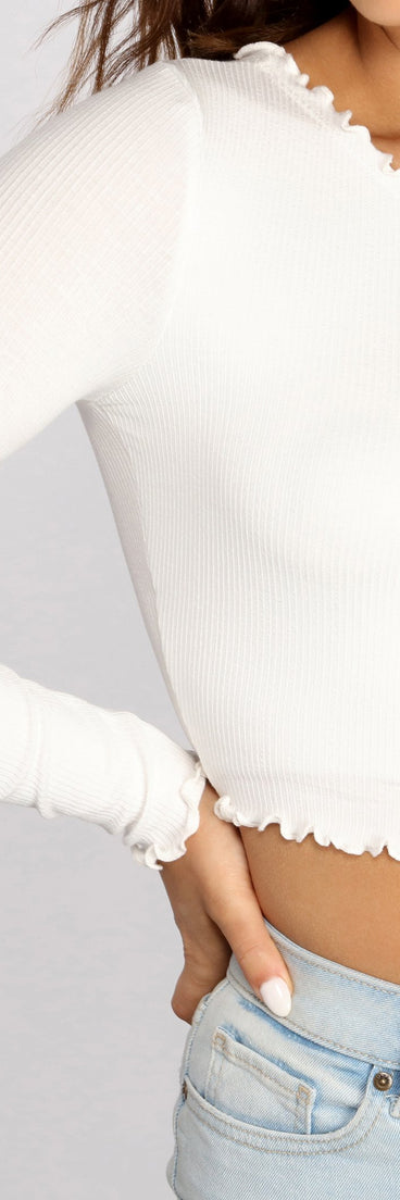 With fun and flirty details, Effortless Edge Ribbed Knit Crop Top shows off your unique style for a trendy outfit for the summer season!