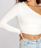 With fun and flirty details, Effortless Edge Ribbed Knit Crop Top shows off your unique style for a trendy outfit for the summer season!
