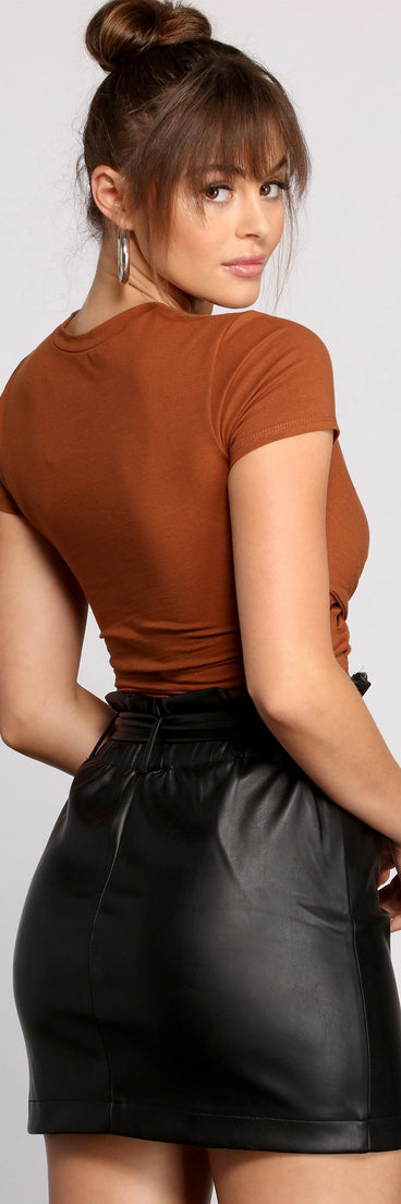 With fun and flirty details, Crossover Chic Crop Top shows off your unique style for a trendy outfit for the summer season!