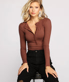 The trendy Button-Front Ribbed Knit Henley Top is the perfect pick to create a holiday outfit, new years attire, cocktail outfit, or party look for any seasonal event!