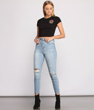 Decorative Skull Black Graphic Tee styled with Cropped Jeans and Black Faux Suede Booties