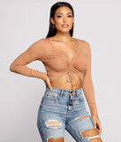 With fun and flirty details, Draw Me In Ribbed Crop Top shows off your unique style for a trendy outfit for the summer season!
