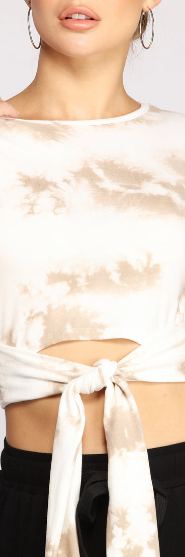 With fun and flirty details, Tie Dye Tie Waist Crop Top shows off your unique style for a trendy outfit for the summer season!