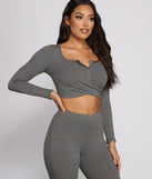 You’ll look stunning in the Ribbed Knit Henley Crop Top when paired with its matching separate to create a glam clothing set perfect for a New Year’s Eve Party Outfit or Holiday Outfit for any event!
