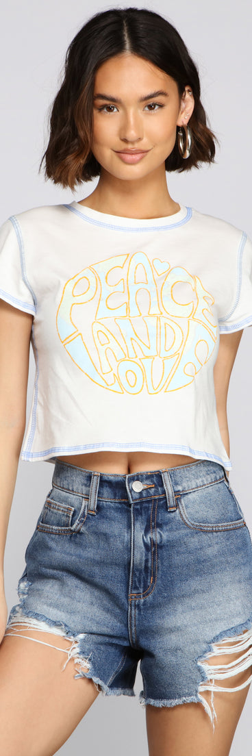 With fun and flirty details, Peace And Love Graphic Tee shows off your unique style for a trendy outfit for the summer season!