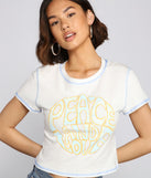 With fun and flirty details, Peace And Love Graphic Tee shows off your unique style for a trendy outfit for the summer season!