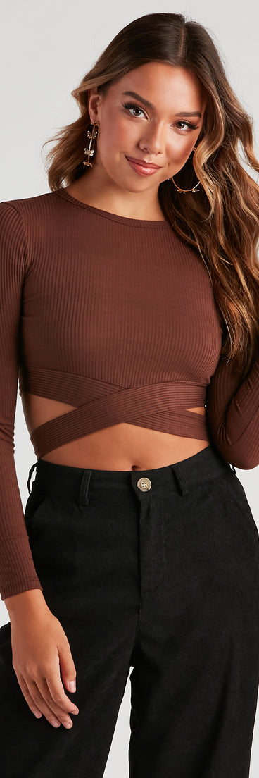 The trendy Trendy Tie-Back Long Sleeve Crop Top is the perfect pick to create a holiday outfit, new years attire, cocktail outfit, or party look for any seasonal event!