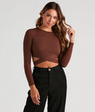 The trendy Trendy Tie-Back Long Sleeve Crop Top is the perfect pick to create a holiday outfit, new years attire, cocktail outfit, or party look for any seasonal event!