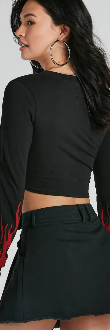 Your outfit will pop with the Flame Racer Tie Front Graphic Crop Top and with dazzling embellishments and elevated details this is the perfect going-out top to stand out at any event!