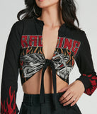 The Flame Racer Tie Front Graphic Crop Top is a short-sleeve top that is cool enough for warm weather and provides a stylish layer to create a trendsetting look.