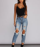 All Up On Black Knit Spaghetti Strap Bodysuit styled with Layering Necklaces, Windsor Jeans for Women, Leopard Print Belt, and Black Combat Boots
