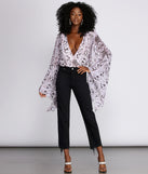 The Drama Bell Sleeve Bodysuit