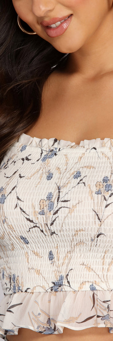 With fun and flirty details, Charming Florals Smocked Crop Top shows off your unique style for a trendy outfit for the summer season!
