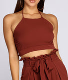 You’ll look stunning in the Ruffle Trim Smocked Halter Top when paired with its matching separate to create a glam clothing set perfect for a New Year’s Eve Party Outfit or Holiday Outfit for any event!
