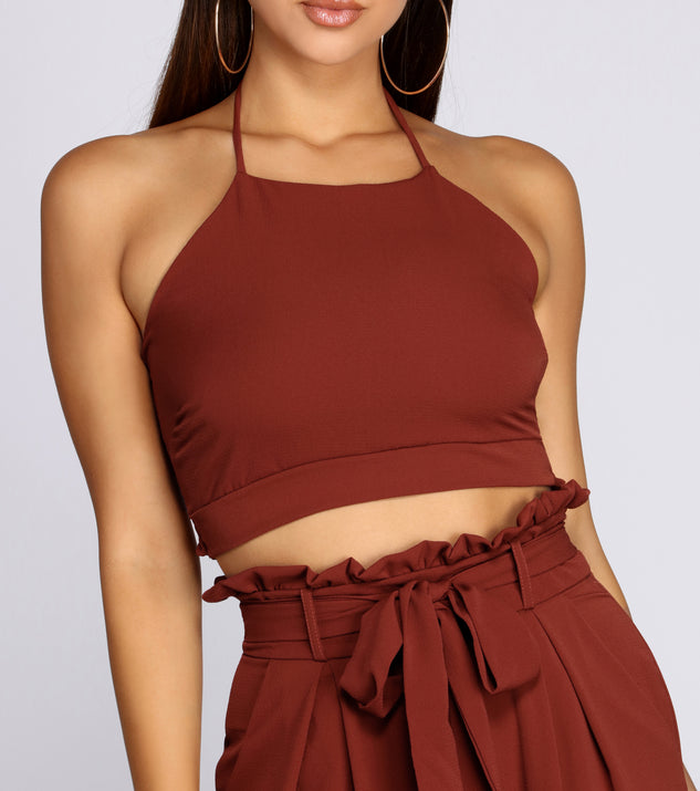 You’ll look stunning in the Ruffle Trim Smocked Halter Top when paired with its matching separate to create a glam clothing set perfect for a New Year’s Eve Party Outfit or Holiday Outfit for any event!