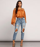 With fun and flirty details, Keep It Chic And Sleek Top shows off your unique style for a trendy outfit for the summer season!