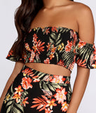 You’ll look stunning in the Hot Tropics Smocked Crop Top when paired with its matching separate to create a glam clothing set perfect for a New Year’s Eve Party Outfit or Holiday Outfit for any event!