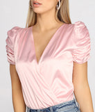 With fun and flirty details, Ruched Satin Surplice Bodysuit shows off your unique style for a trendy outfit for the summer season!