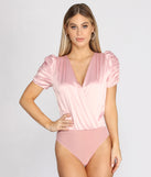 With fun and flirty details, Ruched Satin Surplice Bodysuit shows off your unique style for a trendy outfit for the summer season!