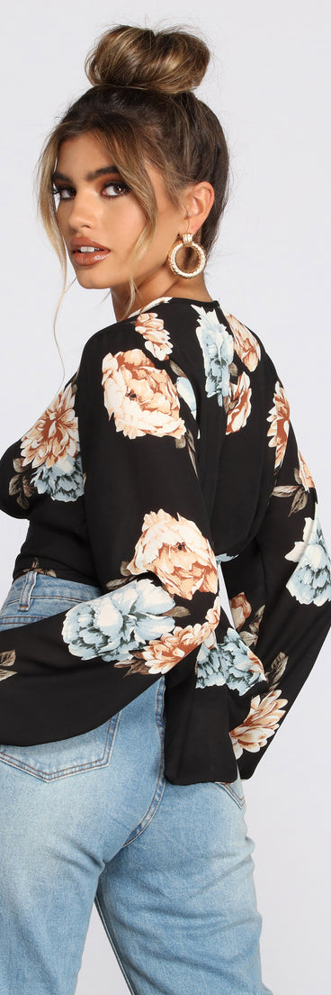 With fun and flirty details, Wrapped In Gorgeous Floral Blouse shows off your unique style for a trendy outfit for the summer season!