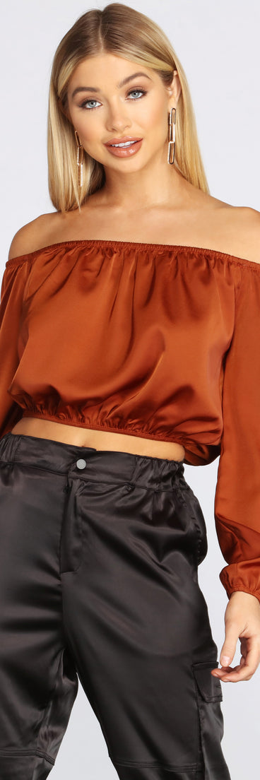 With fun and flirty details, She's A Romantic Satin Off-Shoulder Blouse shows off your unique style for a trendy outfit for the summer season!