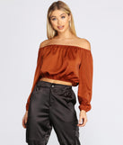 With fun and flirty details, She's A Romantic Satin Off-Shoulder Blouse shows off your unique style for a trendy outfit for the summer season!
