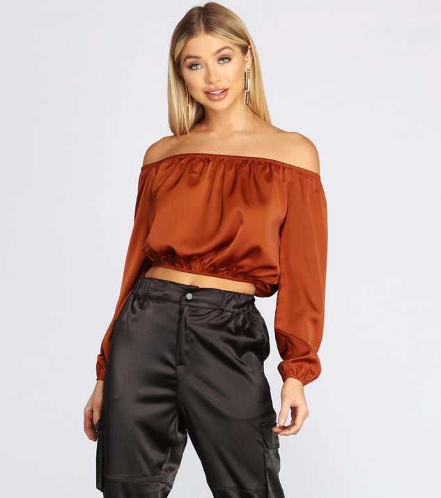 With fun and flirty details, She's A Romantic Satin Off-Shoulder Blouse shows off your unique style for a trendy outfit for the summer season!